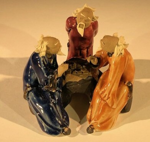 Miniature Ceramic FigurineThree Men Sitting at a Table Playing Chess -