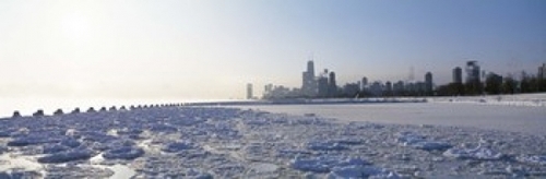 Frozen lake with a city in the background  Lake Michigan  Chicago  Ill