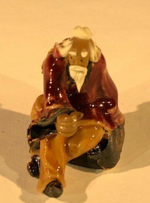 Miniature Ceramic FigurineMan Sitting on Bench2"