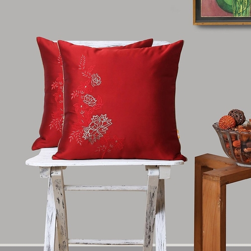 Red 16"x16" cushion with tonal asymetrical embroidery