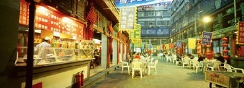 Panoramic Images PPI87528L Group of people sitting outside a restauran