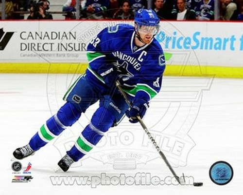 Photofile PFSAAOH08301 Henrik Sedin 2011-12 Action Sports Photo - 10 x
