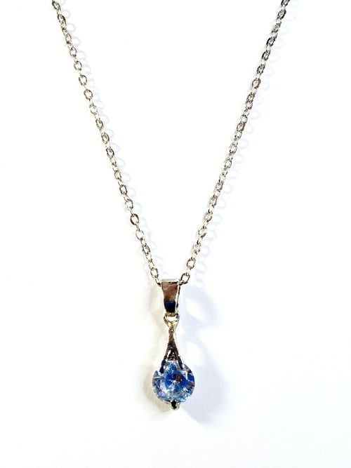 ARTIFICIAL PEAR CUT TANZANITE AND DIAMOND PENDANT