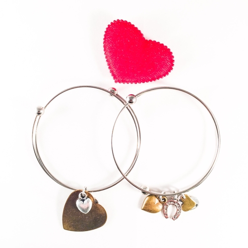 Silver Plated Bangle with bronze heart charms. 2 Styles.