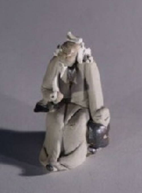 Ceramic Figurine  - Man With Pipe2.5"