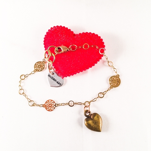 Bronze Heart Charm Bracelet and 18kt Gold Plated Flower Chain.