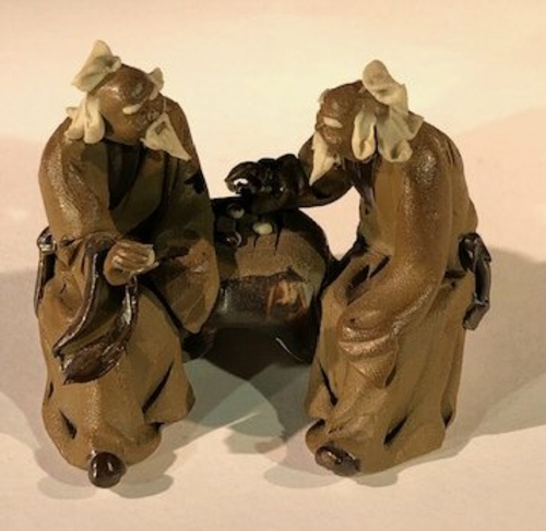 Ceramic FigurineTwo Mud Men Sitting On A Bench Playing Chess - 2.5"