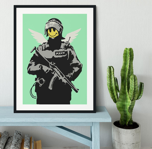 Banksy Smiley Angel Policeman Green Framed Print