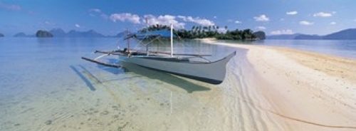 Fishing boat moored on the beach  Palawan  Philippines Poster Print by