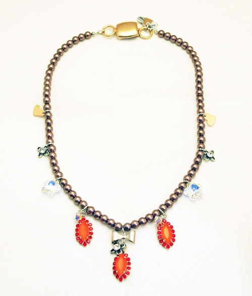 Beaded necklace with orange rhinestones, silver plated brass and small