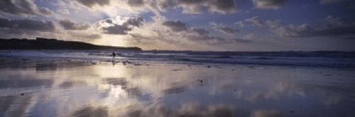 Reflection of clouds on the beach  Fistral Beach  Cornwall  England Po