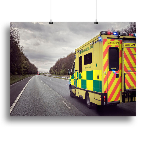 Ambulance responding to an emergency Canvas Print or Poster