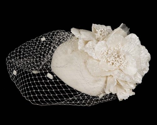 Cream winter racing felt pillbox with flower and veiling