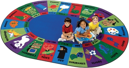 Carpets For Kids 5795 Dewey Decimal Fun 6.75 ft. x 9.42 ft. Oval Rug