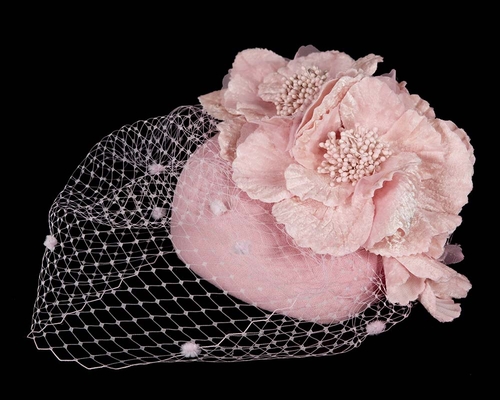 Pink winter racing felt pillbox with flower and veiling