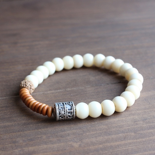 Tibetan buddhism Totem Charm & Tagua Nut