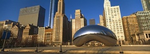 Cloud Gate sculpture with buildings in the background  Millennium Park