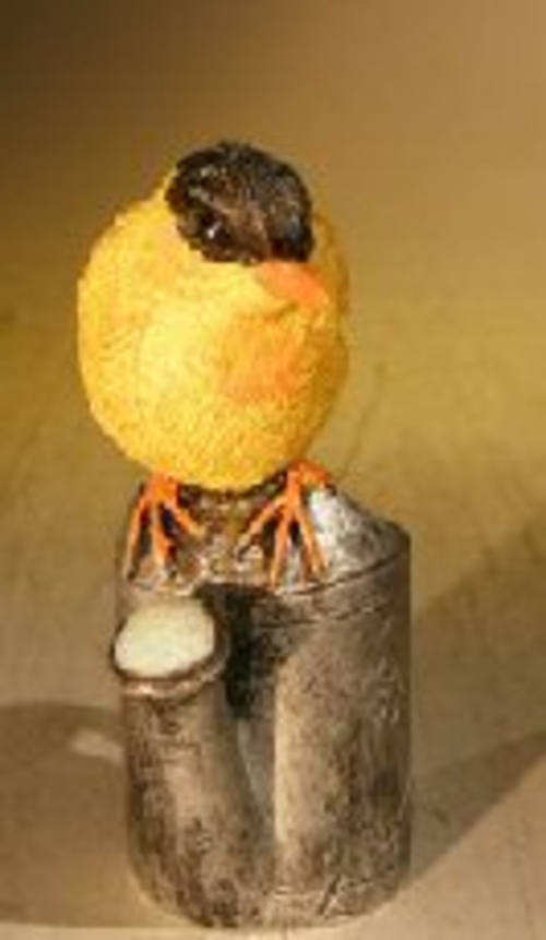Miniature Bird FigurineSitting Atop A Watering Can