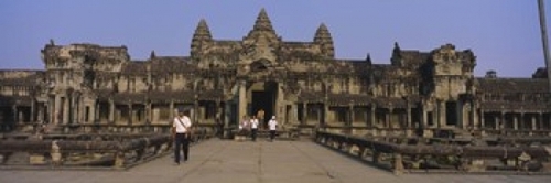 Panoramic Images PPI98689L Tourists walking in front of an old temple 