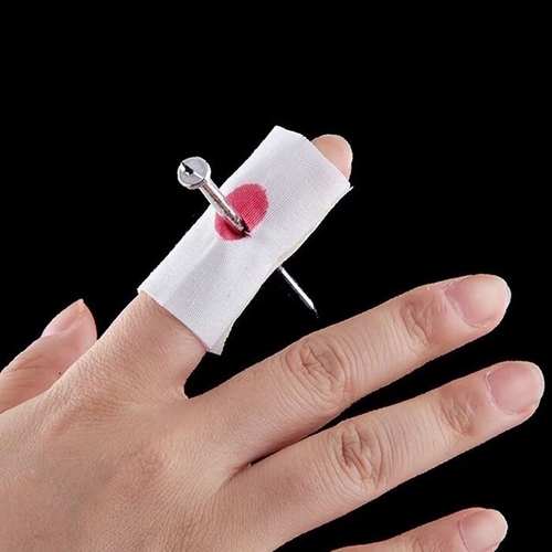 Main Nail Through Finger Trick Toy image