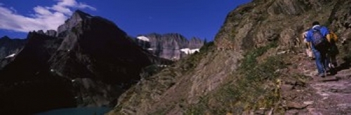Hikers hiking on a mountain  US Glacier National Park  Montana  USA Po