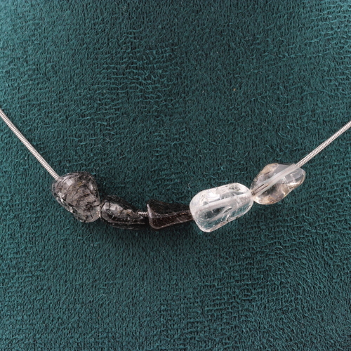 Quartz with Tourmaline inclusions from Brazil 5 beads necklace.