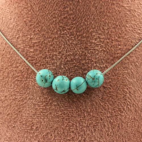 Howlite Turquoise 8 mm 4 beads necklace.