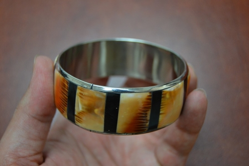 Lion Paw Shell Stainless Steel Bangle