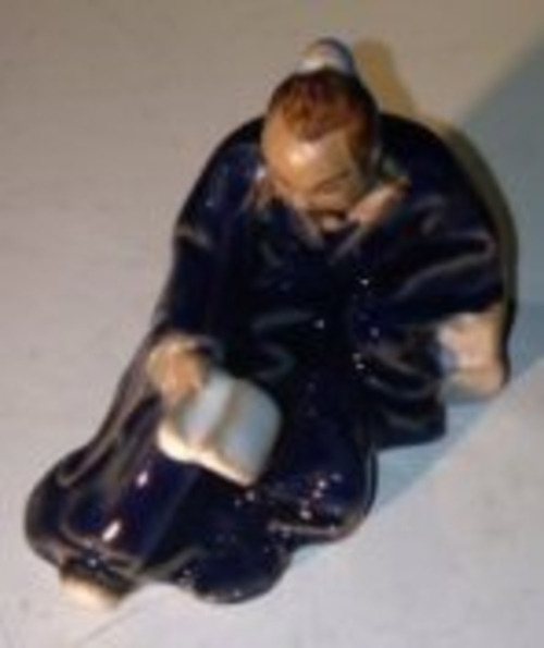 Ceramic FigurineMan Reading Book