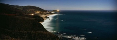 Panoramic Images PPI118897L Lighthouse at the coast  moonlight exposur