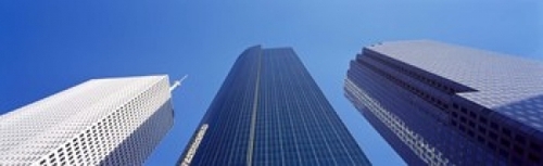 Panoramic Images PPI126395L Low angle view of skyscrapers against blue