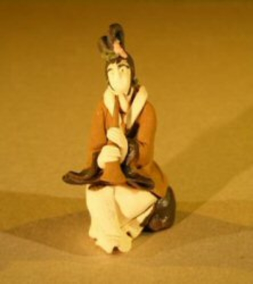 Female Musician Mud FigurinePlaying Wind Instrument