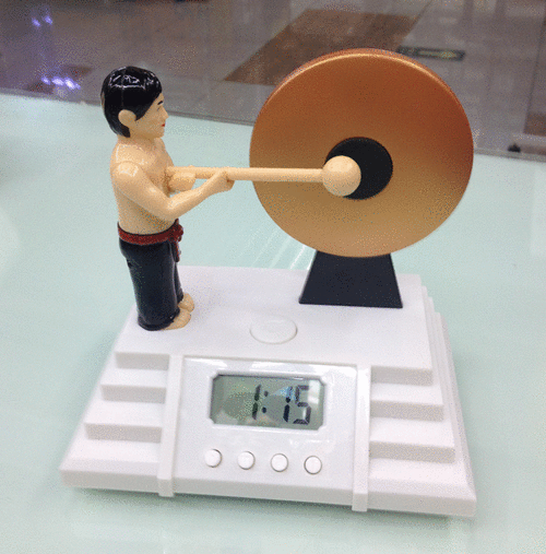 Knock the gong Alarm clock