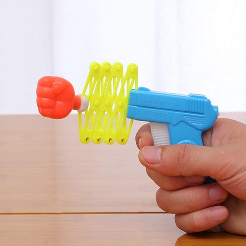 Prank Elastic Spring Fist Magic Weapon Funny