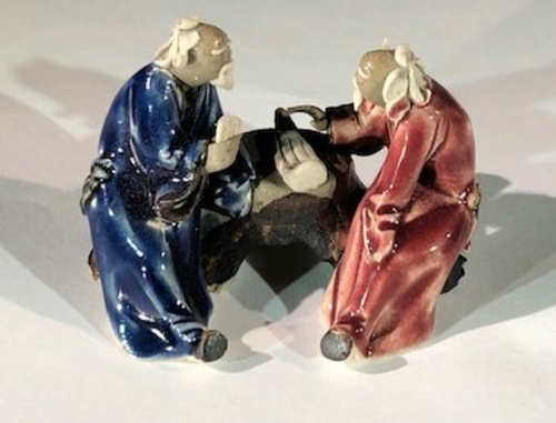 Ceramic FigurineTwo Men Sitting On A Bench - 2"Color: Blue & Red