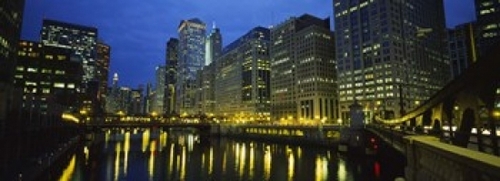 Panoramic Images PPI94689L Low angle view of buildings lit up at night