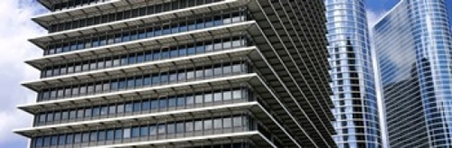 Low angle view of buildings in a city  ExxonMobil Building  Chevron Bu