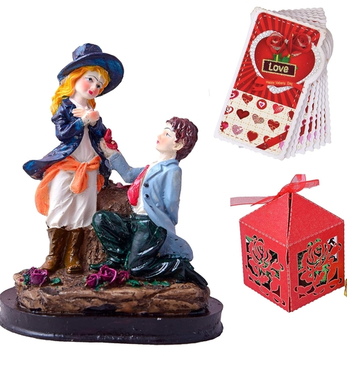 Chocolates in a laser cut nox + proposing couple figurine 