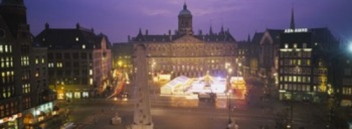 High angle view of a town square lit up at dusk  Dam Square  Amsterdam